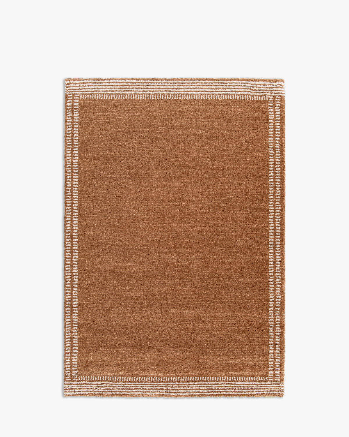 tapis de salon Haven caramel à bordure de tirets écrus sur plusieurs rangs - vu de dessus